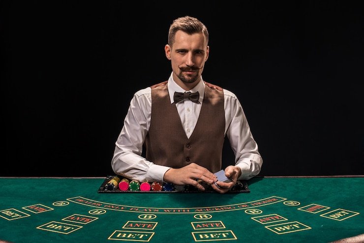 Antarmuka aplikasi tatacasino menampilkan meja live dealer dan menu navigasi